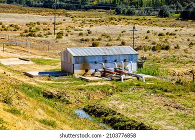 Irrigation Water Pump House With Banks Of Water Bellows To Stop Water Hammer On Fruit Farm In Western Cape, South Africa