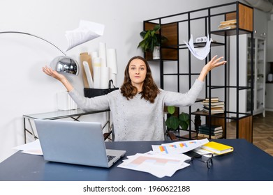 Irritated Business Woman Has Messy On The Desk, A Female Employee Looking Through Workpapers On The Table, Trying To Find Needed But Unsuccessfully, Crazy Woman Throws Paper Up