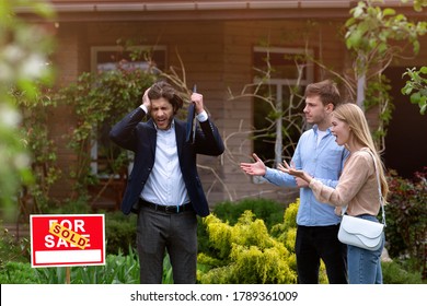 Irritated Real Estate Manager Dealing With Angry Clients In Front Of Residential Property Outside