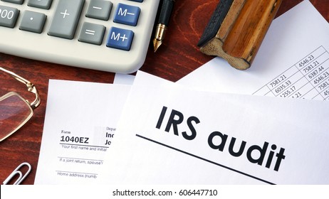 IRS Audit Title On A Document And 1040 Form.