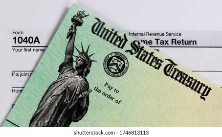 IRS Refund Check And Tax Form In Close Up View  