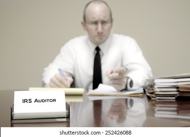 IRS Tax Auditor Man With A Stern Or Mean Expression