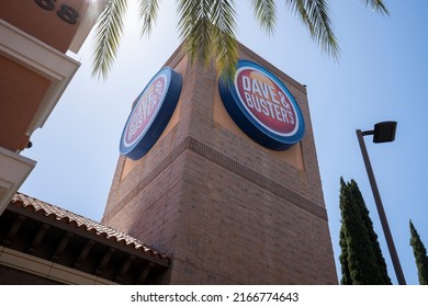 Irvine, CA, USA - May 7, 2022: Dave And Buster's Logo Is Seen Outside Its Sports Bar And Restaurant At Irvine Spectrum Center, A Shopping Mall Located In Orange County, California.