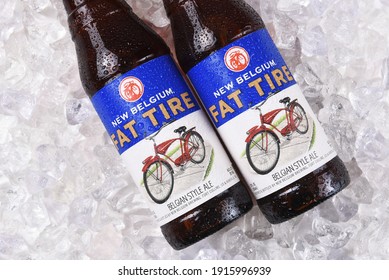 IRVINE, CALIFORNIA - December 14, 2017: Fat Tire Amber Ale Bottles On Ice. From The New Belgium Brewing Company, Of Fort Collins, Colorado.