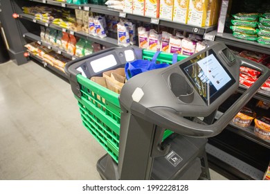 Irvine, California, United States - 06-15-2021: A View Of An Amazon Fresh Grocery Store Smart Shopping Cart, Seen In A Food Aisle.