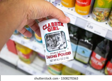 Irvine, California/United States - 08/09/2019: A Hand Holds A Can Of Clabber Girl Double Acting Baking Powder At The Grocery Store