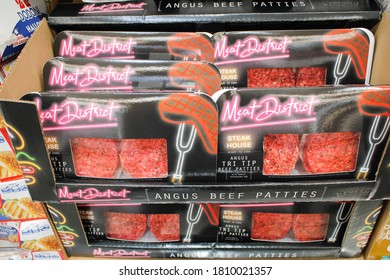 Irvine, California/United States - 09/01/2020: A View Of Several Packages Of Meat District Steak House Ready To Cook Angus Tri Tip Beef Patties, On Display At A Local Big Box Grocery Store.