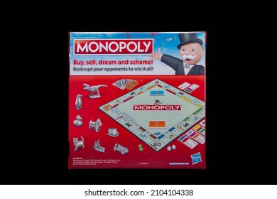 Irvine, Scotland, UK - December 13, 2021: Hasbro Branded Monopoly Original Board Game In Sealed Cardboard Box.