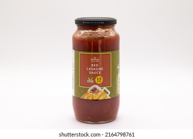 Irvine, Scotland, UK - May 18, 2022: Morrisons Branded Red Lasagne Sauce In A Glass Jar Metal Lid And Paper Label That Is Recyclable.