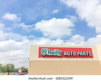 IRVING, TX, USA-MAY 2, 2018:Close-up Logo Of O’Reilly Auto Parts Store Chain Under Cloud Blue Sky. American Retailer Provides Automotive Aftermarket Parts, Tools, Supplies, Equipment, And Accessories