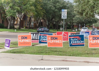 IRVING, TX, USA-OCT 22, 2018:Row Of Yard Sign At Residential Street For Primary Election Day In Dallas County, Texas, USA. Signs Greeting Early Voters, Political Party Posters For The Midterm Election