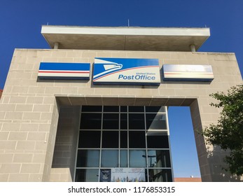 IRVING, TX, USA-SEP 2, 2018:Close-up Brand Logo At Exttorior Of USPS Store Clear Blue Sky. The United States Postal Service Is An Independent Agency Of US Federal Government Providing Postal Service