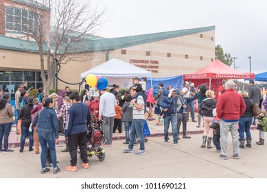 IRVING, TX, US-JAN 27, 2018: 2nd Annual Frost Fest At Cimarron Park. A Free Winter Festival Offering Family Fun Activities. Diverse People, Crowded Enjoy Complimentary Snow Play Area With Fresh Snow