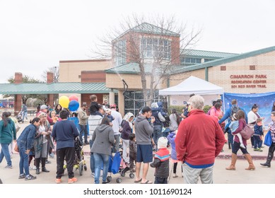 IRVING, TX, US-JAN 27, 2018: 2nd Annual Frost Fest At Cimarron Park. A Free Winter Festival Offering Family Fun Activities. Diverse People, Crowded Enjoy Complimentary Snow Play Area With Fresh Snow