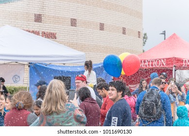 IRVING, TX, US-JAN 27, 2018: 2nd Annual Frost Fest At Cimarron Park. A Free Winter Festival Offering Family Fun Activities. Diverse People, Crowded Enjoy Complimentary Snow Play Area With Fresh Snow