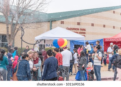 IRVING, TX, US-JAN 27, 2018: 2nd Annual Frost Fest At Cimarron Park. A Free Winter Festival Offering Family Fun Activities. Diverse People, Crowded Enjoy Complimentary Snow Play Area With Fresh Snow