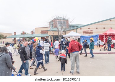 IRVING, TX, US-JAN 27, 2018: 2nd Annual Frost Fest At Cimarron Park. A Free Winter Festival Offering Family Fun Activities. Diverse People, Crowded Enjoy Complimentary Snow Play Area With Fresh Snow