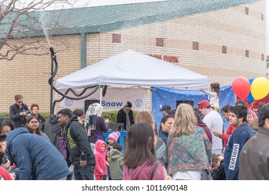 IRVING, TX, US-JAN 27, 2018: 2nd Annual Frost Fest At Cimarron Park. A Free Winter Festival Offering Family Fun Activities. Diverse People, Crowded Enjoy Complimentary Snow Play Area With Fresh Snow