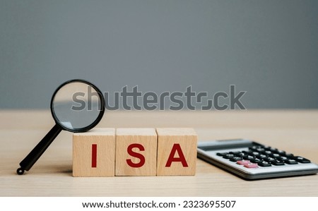 ISA - Individual Savings Account on a wooden blocks. Class of retail investment arrangement available to residents of the United Kingdom. Business and finance concept