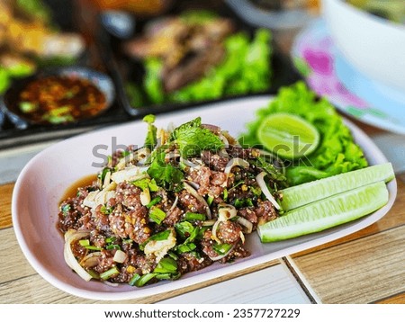Isaan Food, Thai Food Dishes Larb Koi. Raw Beef Spicy Salad. Northeastern Thai Dishes. Raw meat mixed with spices is spicy.