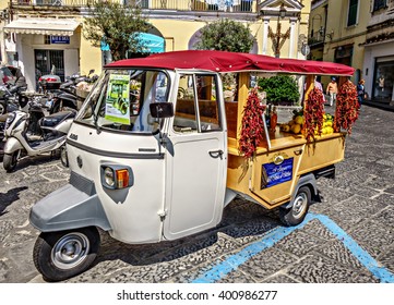 Ischia, Italy - May 10, 2014: Ischia Italy Spring Limoncello Advertising Three-wheeled Car In A Small Square Of The Beautiful Island Of Ischia.Italy