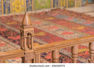 ISFAHAN, IRAN - 14 OCTOBER 2015: Detail of the interior of the Vank Cathedral or Church of Saint Joseph of Arimathea, where a miniature of the cathedral can be seen in front of the persian carpets.