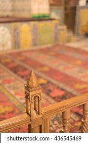 ISFAHAN, IRAN - 14 OCTOBER 2015: Detail of the interior of the Vank Cathedral or Church of Saint Joseph of Arimathea, where a miniature of the cathedral can be seen in front of the persian carpets.