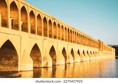 Isfahan, Iran - May 2022: SioSe Pol or Bridge of 33 arches, one of the oldest bridges of Esfahan and longest bridge on Zayandeh River - Powered by Shutterstock