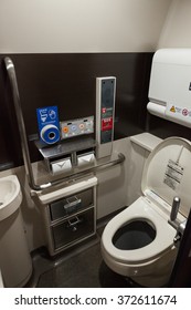 ISHIKAWA , JAPAN - APRIL 6 : High-tech Toilets In E7 Series Bullet Train On April 6 , 2015 In Ishikawa, Japan. This Toilets Provide Users A Wide Variety Of Functions.