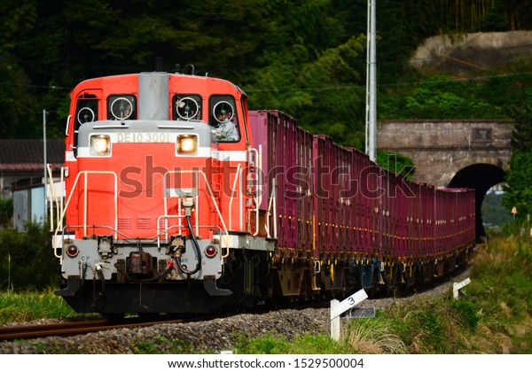 Ishinomaki,\
Japan - 9/20/2019: Container trains that are driven by the\
DE10-type vehicle on the Ishinomaki\
Line