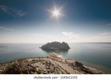 
Isla Del Fraile In Aguilas, Murcia, Spain. At Noon, Just When The Sun Is Over The Island.