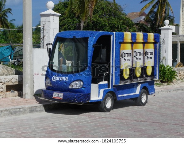 Isla Mujeres,\
Quintana Roo / Mexico - January 21 2012: Blue Corona Extra Beer\
Small Sized Truck Parked in the\
Street