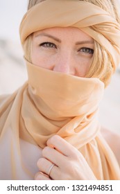 Islam girl in the desert with a scarf on her head scarf burqa hijab