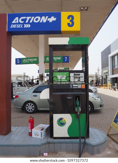 Islamabad, Pakistan - 1 May 2018 ; Local Petrol\
station ( Diesel gas station ) for filling up the car, motorcycle,\
Truck, Bus and Pick up car oil fuel.\

