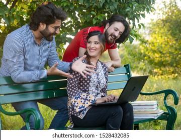 Islamabad, Pakistan. October 8th, 2019. People Enjoying In The Park With Laptop In Hand.