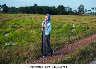 Islamic beautiful woman in a modern oriental dress