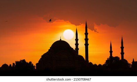 Islamic building. Mosque background. Silhouette of Suleymaniye Mosque at sunset. Background for Ramadan and religious days. Important religious structure and touristic places of Istanbul.