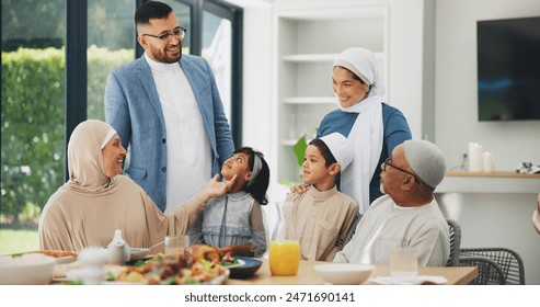 Islamic, family and dinner in home for ramadan, muslim celebration and food on dining table. Eid mubarak, culture and religious gathering with grandparents, children and mom or dad for bonding - Powered by Shutterstock