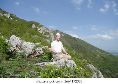 Islamic Man Praying On The Mountain.