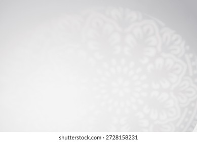 Islamic pattern in arabesque overlay on white wall for Eid Mubarak, Ramadan background with Abstract geometry design Traditional art ornament of Arabic texture with mandala for Decoration