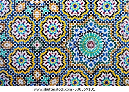 Islamic pattern of a mosaic in Moroccan style. Tiled oriental ornaments from Morocco are found in mosques and important buildings