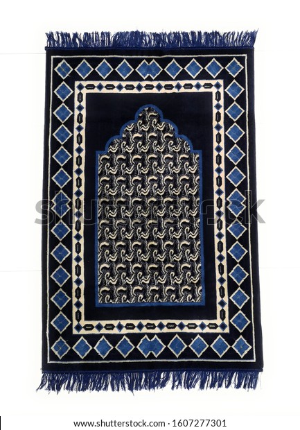 An Islamic prayer mat used by  Muslims to pray.\
This is a pure surface which is suitable for prayer. The prayer\
mats feature a Minwal design inspired by the great mosques of Mecca\
& Medina.