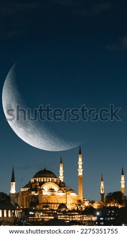 Islamic vertical photo. Suleymaniye Mosque with crescent moon. Ramadan or laylat al-qadr or kadir gecesi concept vertical photo.
