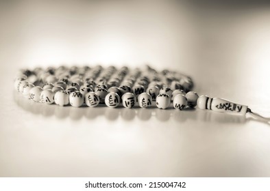 Islamic White beads with gray background 