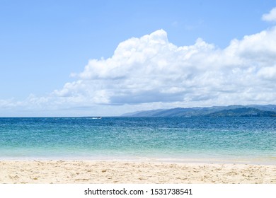 Island In The Carribean Sea With White Beach