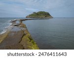 The island of Garraitz or San Nicolás, located in the center of Lekeitio Bay, is a significant enclave on the Basque coast in northern Spain.