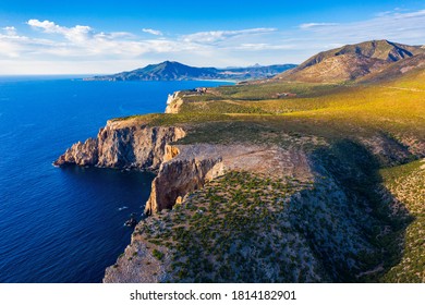 Island of Sardinia, western Mediterranean rugged coast, Italy. Mediterranean island of Sardinia (Sardegna), Italy. Cliffs at the western shore, Sardinia, Italy.