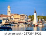 Island town of Krk waterfront sails view, Kvarner region of Croatia