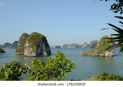 Islands In Halong Bay, Gulf Of Tonkin, North East Vietnam On A Sunny Day