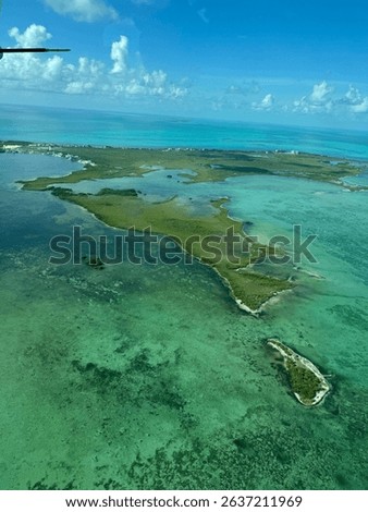 Islands in the ocean while flying a small plane